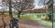 Outdoor Seating with Scenic Views at Borrowdale Gates Hotel in Grange near Keswick, Lake District