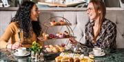 Guests Enjoying Afternoon Tea at The Borrowdale Hotel in Borrowdale, Lake District