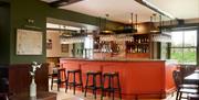 Bar and bar seating at The Brackenrigg Inn in Ullswater, Lake District