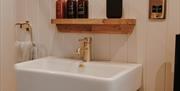 Bathroom sink at Brackenslack Shepherds Huts in Maulds Meaburn, Cumbria