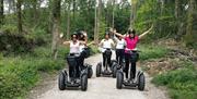 Visitors enjoying an experience with Lakeland Segway in Cartmel, Lake District