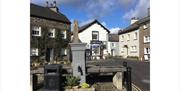 Exterior and Village Square at Cartmel Village Shop in Cartmel, Cumbria