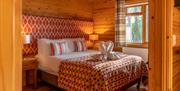 Bedroom at Chiffchaff Lodge at The Tranquil Otter in Thurstonfield, Cumbria