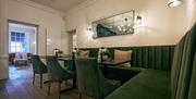 Dining room seating at The Wilding Hotel in Brough, Cumbria