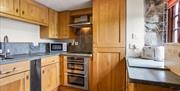 Kitchen at The Coppermines Mountain Cottages in Coniston, Lake District