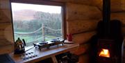 Kitchen and Window of a Glamping Cabin at Thornthwaite Farm in Broughton-in-Furness, Lake District