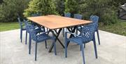 Outdoor dining table at Cottesloe in Greystoke Gill, Cumbria