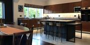 Kitchen and dining areas at Cottesloe in Greystoke Gill, Cumbria