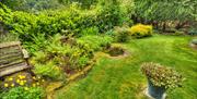 Garden and Outdoor Seating at Crow How Country Guest House in Ambleside, Lake District