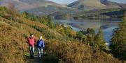 Walkers Enjoying a Lakeside Walk on a Walking Holiday from The Carter Company in the Lake District, Cumbria