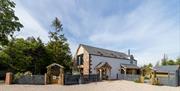 View from the Drive of the Exterior of Dandelion and Hoglet Cottages in Dalston, Cumbria