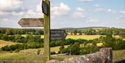 Signage for the Hadrian's Wall Trail near Dandelion and Hoglet Cottages in Dalston, Cumbria