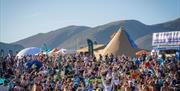 Tents and visitors at Keswick Mountain Festival in Keswick, Lake District