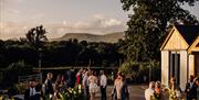 Guests gathered outside Eden Barn in Kirkby Stephen, Cumbria
