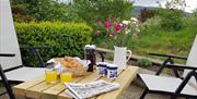 Outdoor Seating at Beckside at Southwaite Green Farm near Cockermouth, Cumbria