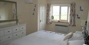 Bedroom at Birslack Cottage in Levens, Cumbria