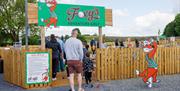 Family Entering Foxy's Adventure Golf in Penrith, Cumbria