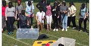 Visitors Playing Archery Tag with Genuine Adventures in the Lake District, Cumbria