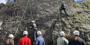 Visitors Rock Climbing with Genuine Adventures in the Lake District, Cumbria