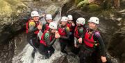 Visitors Ghyll Scrambling with Genuine Adventures in the Lake District, Cumbria