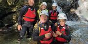 Visitors Ghyll Scrambling with Genuine Adventures in the Lake District, Cumbria