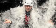 Visitors Ghyll Scrambling with Genuine Adventures in the Lake District, Cumbria