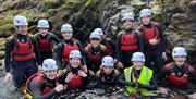 Visitors Ghyll Scrambling with Genuine Adventures in the Lake District, Cumbria