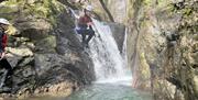 Visitors Ghyll Scrambling with Genuine Adventures in the Lake District, Cumbria