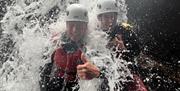 Visitors Ghyll Scrambling with Genuine Adventures in the Lake District, Cumbria