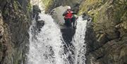 Visitors Ghyll Scrambling with Genuine Adventures in the Lake District, Cumbria