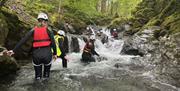 Visitors Ghyll Scrambling with Genuine Adventures in the Lake District, Cumbria