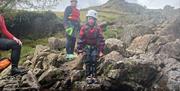 Visitors Ghyll Scrambling with Genuine Adventures in the Lake District, Cumbria