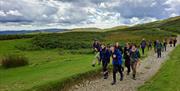 Visitors on a Guided Walk with Genuine Adventures in the Lake District, Cumbria