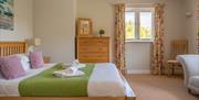 Bedroom in a Self Catered Cottage at the Graythwaite Estate in Graythwaite, Lake District