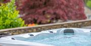Hot Tub at a Self Catered Cottage at the Graythwaite Estate in Graythwaite, Lake District