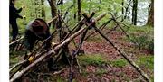 Visitor Making a Shelter on the Extreme 24 Hour Survival Challenge with Green Man Survival