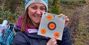 Visitor with Shooting Target with Green Man Survival in Newby Bridge, Lake District