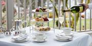 Afternoon Tea Spread with Champagne at Gilpin Lake House in Windermere, Lake District