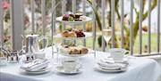 Afternoon Tea Spread with Champagne at Gilpin Lake House in Windermere, Lake District