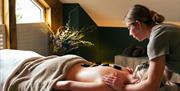 Visitor Receiving a Massage at the Spa Space at Gilpin Hotel near Windermere, Lake District