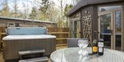 Hot Tubs with Lodges at Flusco Wood Holiday Lodges in Cumbria