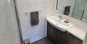 Shower and Sink in a Bathroom at Heather View in Threlkeld, Lake District