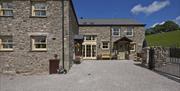 Exterior of Helm Mount Lodge & Cottages in Barrows Green, Cumbria