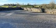 Outdoor and Parking Spaces at Helm Mount Lodge & Cottages in Barrows Green, Cumbria