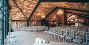 Ceremony seating at Hidden River Barn near Longtown, Cumbria