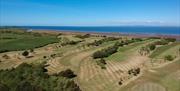 Hole 10 dogleg tee & fairway at Maryport Golf Club in Maryport, Cumbria