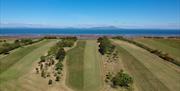 Hole 8 fairway towards green at Maryport Golf Club in Maryport, Cumbria