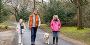 Family and dog for a walk at Holgates Holiday Park in Silverdale, Cumbria