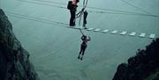 Visitor Participating in The Jump Freefall at Honister Slate Mine in Borrowdale, Lake District