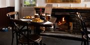 Food and fireplace at The Wordsworth Hotel in Grasmere, Lake District
